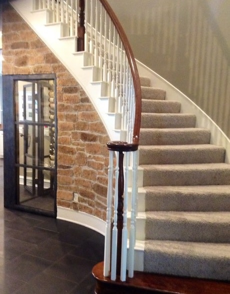 Space Under the Stairs Converted into a Contemporary Wine Cellar