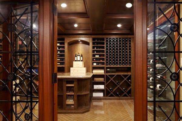 Metal and wood Wine Racks Designed for a Las Vegas Custom Home Wine Cellar