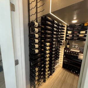 3 - This clean, contemporary closet wine cellar uses vertical wall-mounted racks and recessed LED lighting to turn every inch into a design feature.